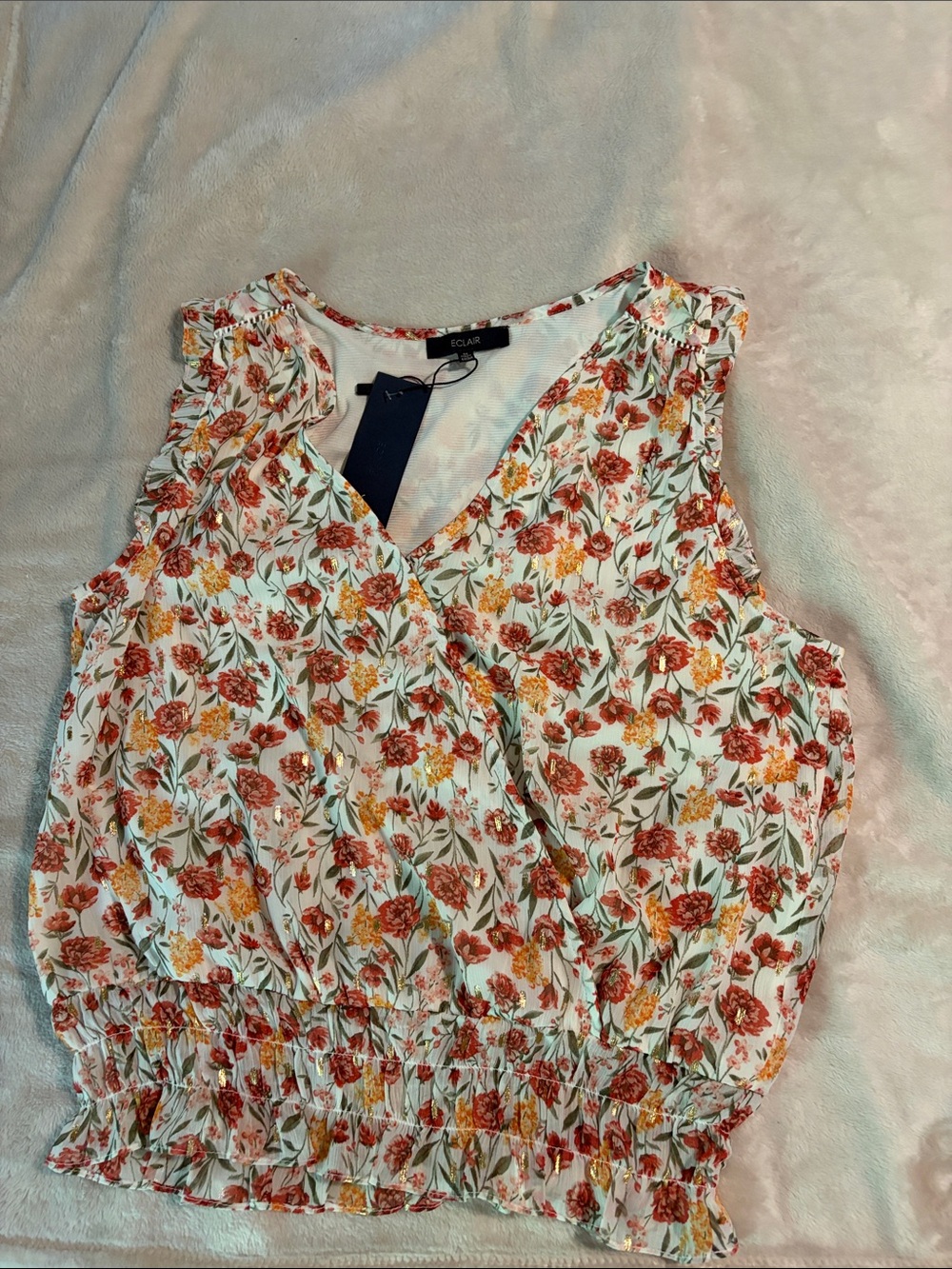 ECLAIR Floral Sleeveless crossover sleeveless top with Rust & Yellow Flowers.